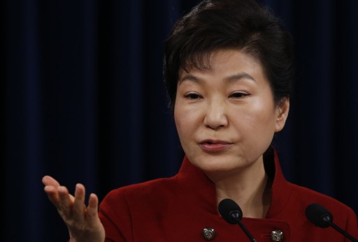 South Korea's President Park Geun-hye answers a reporter's question during her New Year news conference at the Presidential Blue House in Seoul