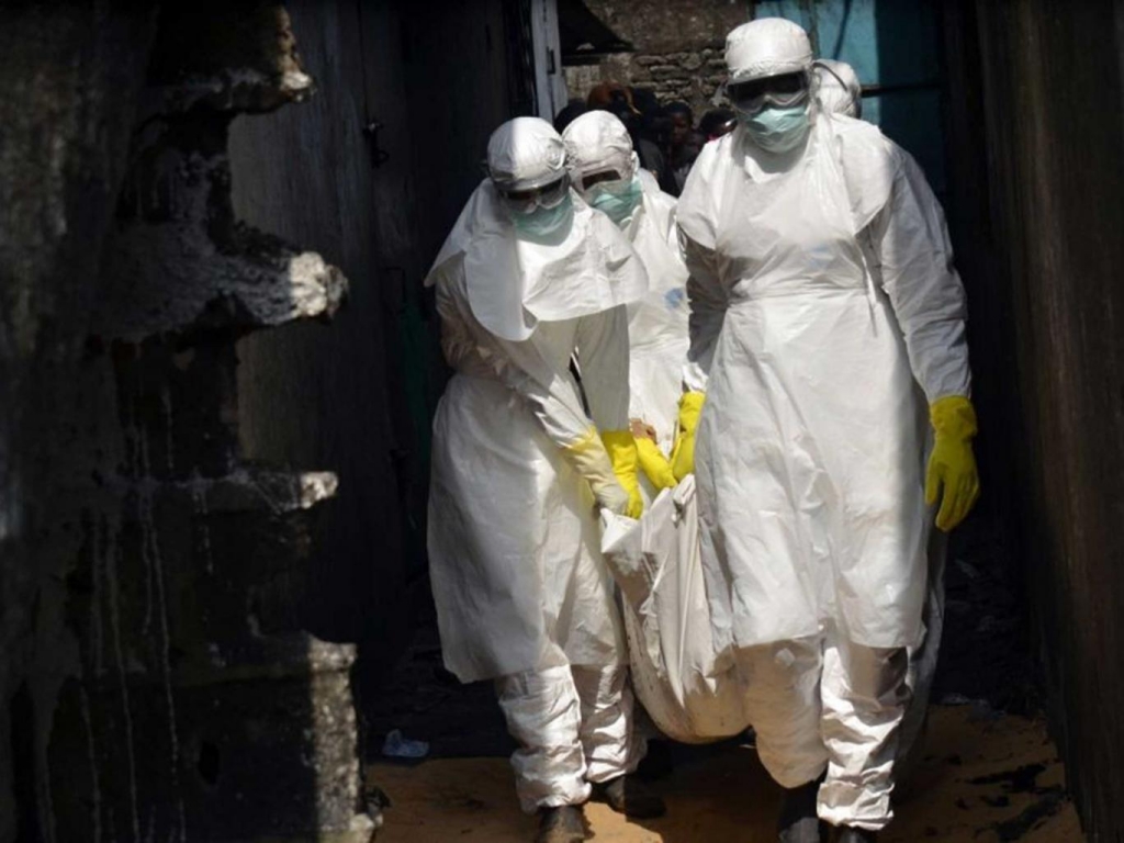 Nurses carry a victim from Monrovia in January AFP  Getty