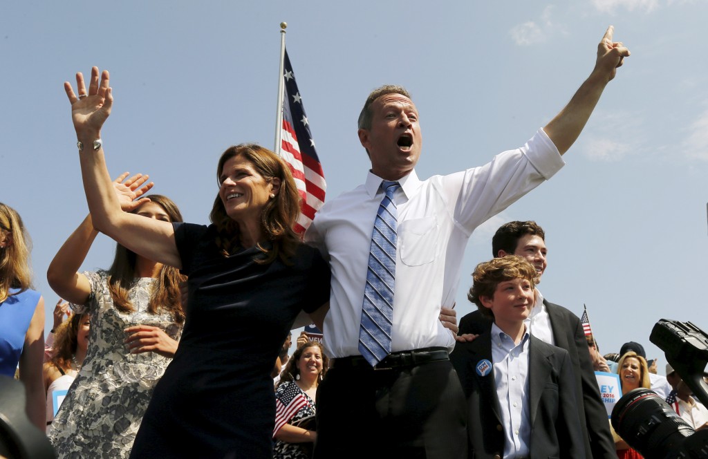 Former Maryland Gov. Martin O'Malley waves to the crowd with his wife Katie after formally announcing his campaign for the 2016 Democratic presidential nomination in Baltimore Maryland