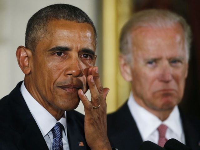 US President Barack Obama wipes tears while delivering a statement on steps the administration is taking to reduce gun violence in the East Room of the White House in Washington