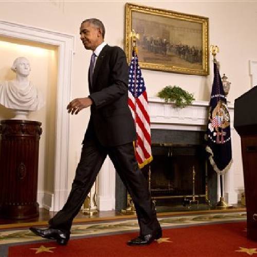 Obama walks away from the podium after making a statement on the release of Americans by Iran Sunday Jan. 17 2016 in the Cabinet Room of the White House in Washington