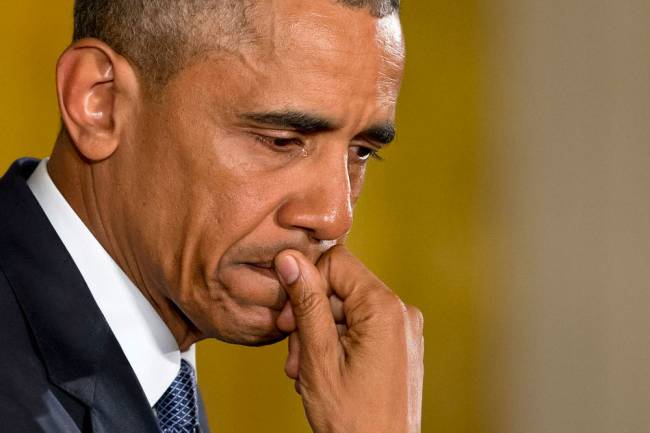 An emotional President Barack Obama pauses as he speaks about the youngest victims of the Sandy Hook shootings Tuesday Jan. 5 2016 in the East Room of the White House in Washington