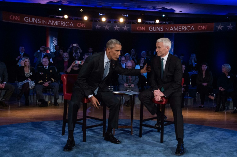 AFP  Nicholas KammUS President Barack Obama chats with CNN's Anderson Cooper during a town-hall style forum on reducing gun violence where Obama challenged critics who he said have'mischaracterized his position