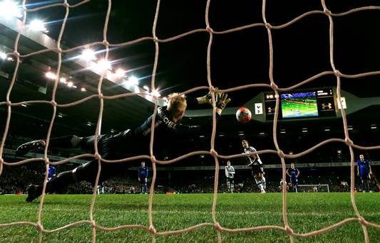 On the spot Harry Kane strokes his penalty past Kasper Schmeichel in the Leicester goal to earn Spurs a replay