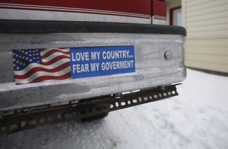 A bumper sticker on a private truck is seen in front of a residential building at the Malheur National Wildlife Refuge near Burns Oregon