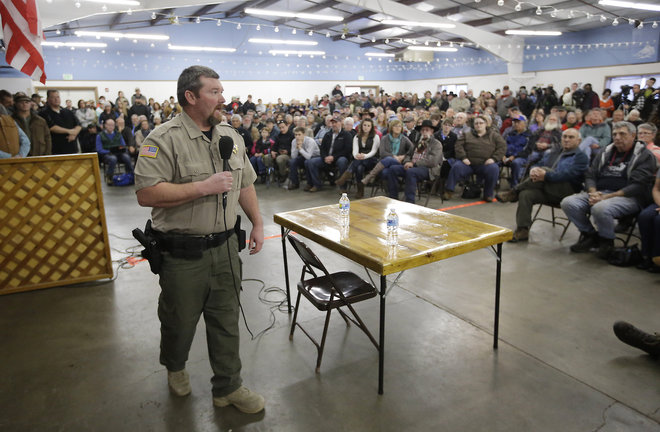 Harney County Sheriff David Ward listens to concerns during a community meeting at the Harney County fairgrounds Wednesday Jan. 6 2016 in Burns Ore