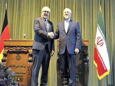 Iran’s Foreign Minister Mohammad Javad Zarif with his German counterpart Frank Walter Steinmeier after a joint news conference in Tehran on Sunday