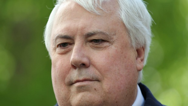 Clive Palmer's company Queensland Nickel donated almost $290,000 to his troubled political party just two weeks before sacking 237 workers from its Townsville refinery