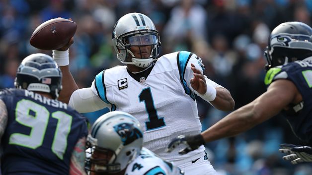 CHARLOTTE NC JANUARY 17 Cam Newton #1 of the Carolina Panthers in action against the Seattle Seahawks during the NFC Divisional Playoff Game at Bank of America Stadium