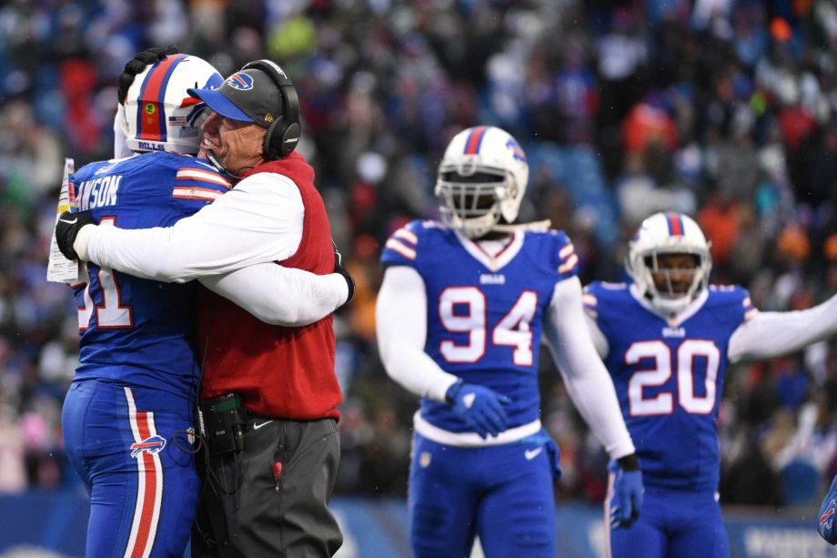 Buffalo Bills head coach Rex Ryan hugs Buffalo Bills Manny Lawson after Lawson intercepted a pass during the second half of an NFL football game against the New York Jets Sunday Jan. 3 2016 in Orchard Park N.Y. The Bills won 22-17