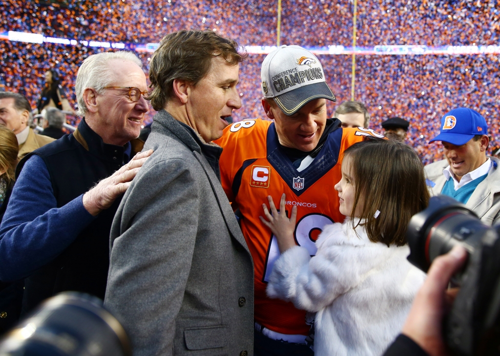 Jan 24 2016 Denver CO USA  Denver Broncos quarterback Peyton Manning greets daughter Mosley Manning, brother Cooper Manning and father Archie Manning after defeating the New England Patriots in the AFC Champion