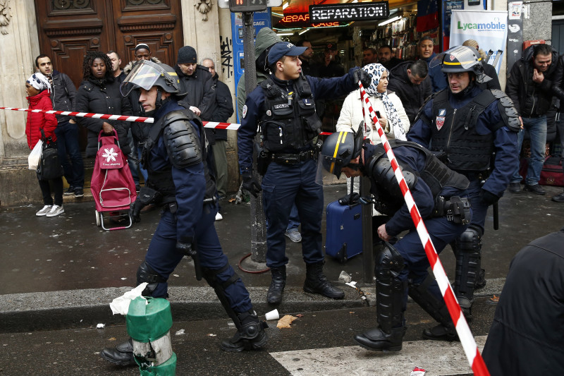 Police in Paris on Thursday shot dead a knife-wielding man who tried to enter a police station police union sources said