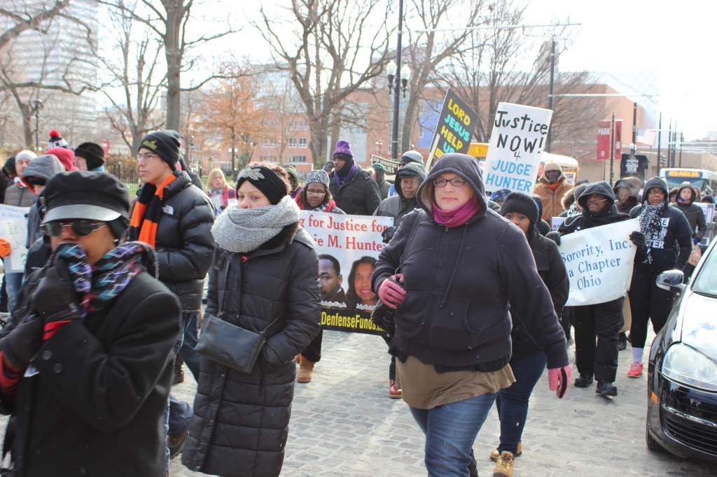 Participants bundled up and marched from the Freedom Center and Fountain Square to Music Hall for a MLK program