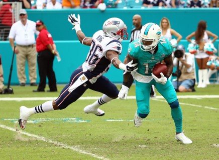 Jan 3 2016 Miami Gardens FL USA Miami Dolphins wide receiver Jarvis Landry avoids a tackle from New England Patriots defensive back Brandon King during the second half at Sun Life Stadium. The Dolphins won 20-10. Mandatory Credit Steve Mit