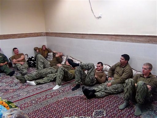 Iranian Revolutionary Guards on Wednesday Jan. 13 2016 shows detained American Navy sailors in an undisclosed location in Iran. Iranian state television is reporting that all 10 U.S. sailors detained by Iran after entering