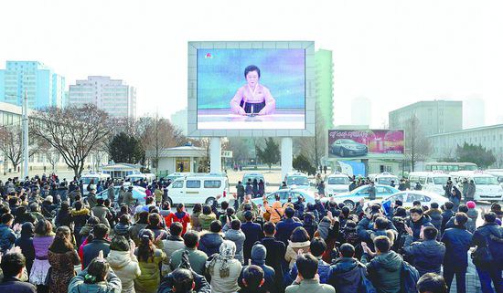 People in Pyongyang watch the news presenter announcing the successful test of the country’s first hydrogen bomb