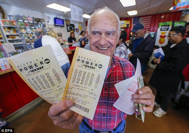 Pete Gagliano of McCalla Alabama shows the tickets he purchased for the multi-state lottery