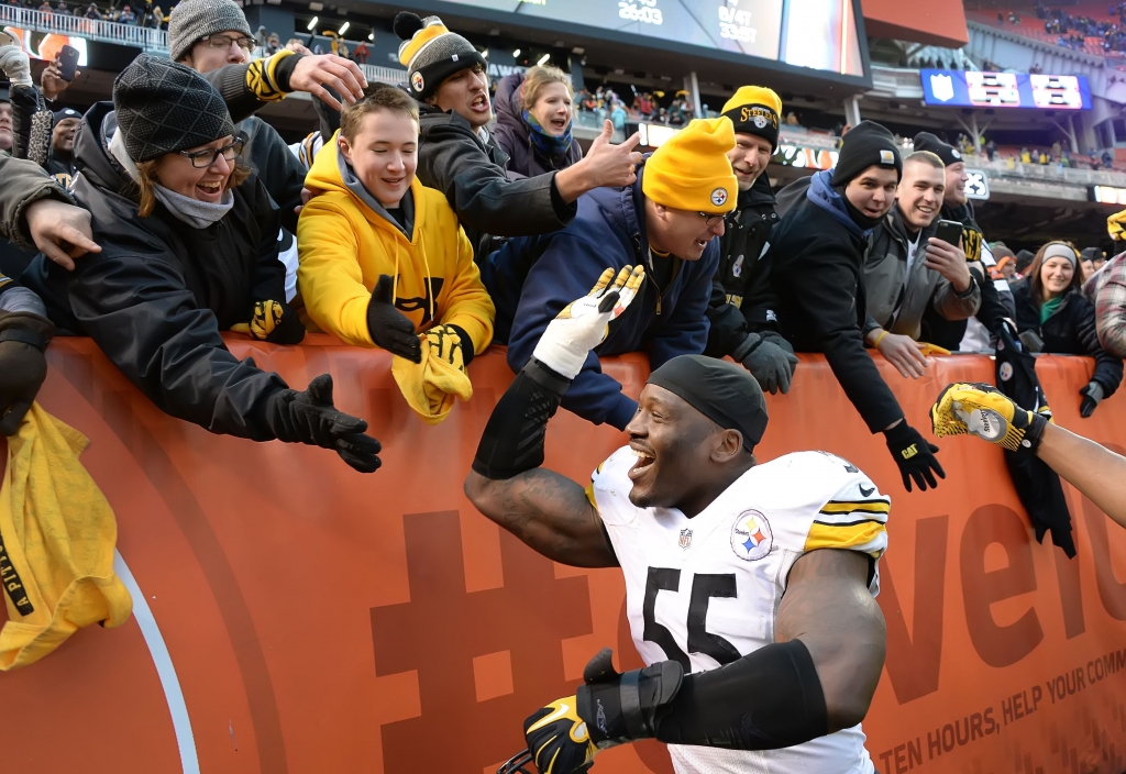 20160103pdSteelersSports07-2 Arthur Moats celebrates with fans Sunday after the Steelers beat the Browns in Cleveland