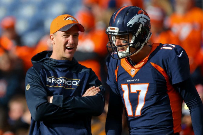 Peyton Manning discusses strategy with Brock Osweiler