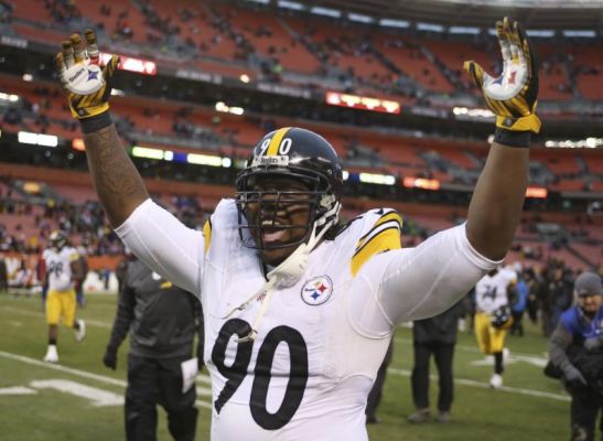 Pittsburgh Steelers nose tackle Steve Mc Lendon celebrates after