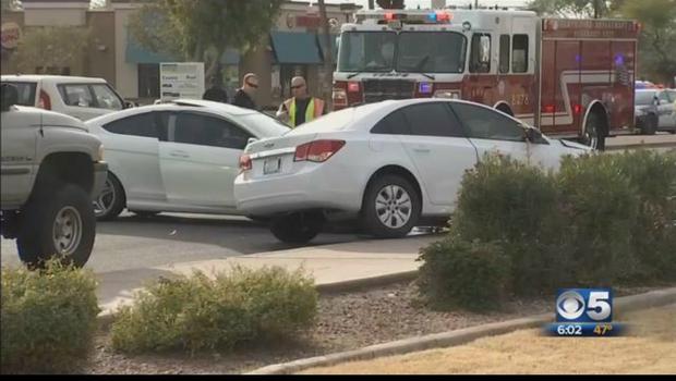 Police: Suspect held in fatal Tempe shooting after collision