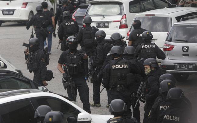 Indonesia policemen in action