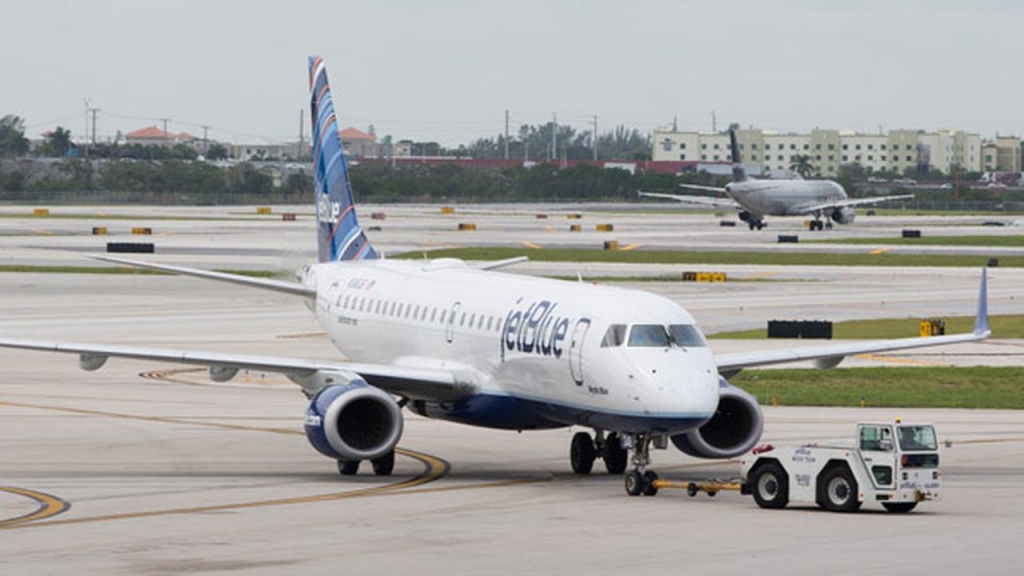 FILE A Jet Blue Embraer 190 passenger jet is towed to an arrival gate at the Fort Lauderdale Hollywood International Airport Friday Dec. 18 2015 in Fort Lauderdale Fla