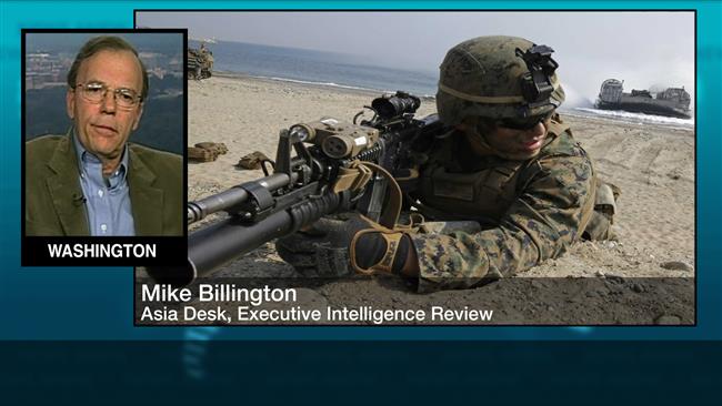 President Barack Obama “is interested in building up forces for the attack on China” and Russia says Mike Billington