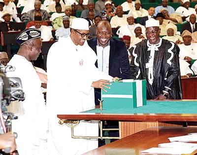 President Buhari while presenting 2016 budget at the National Assembly