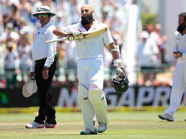 Hashim Amla raises his bat as he celebrates scoring a doube century during day 4 of the second Test match between England and South Africa at Newlands stadium