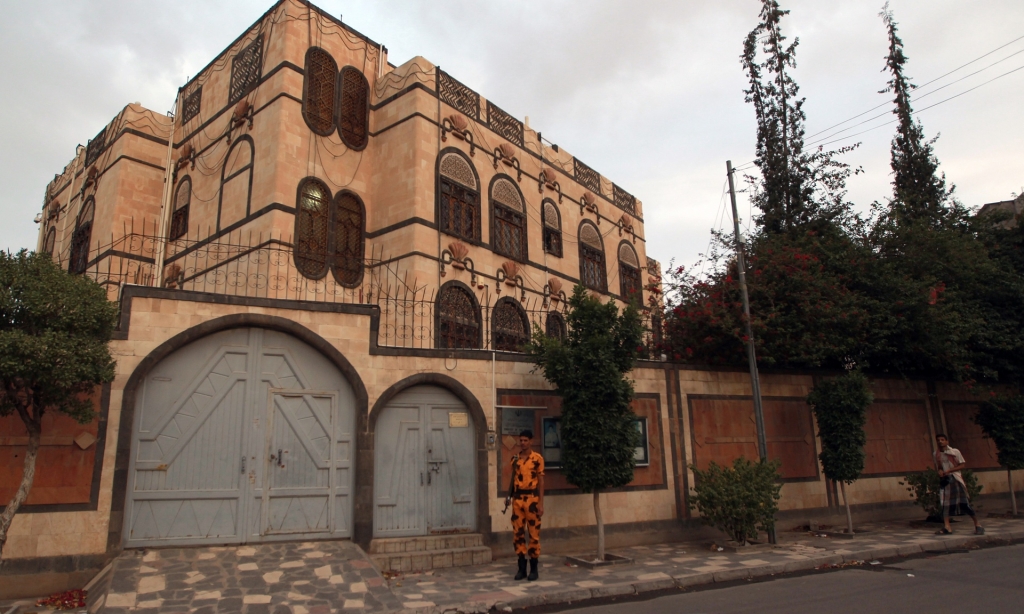 A Yemeni soldier stands guard in front of the Iranian embassy in Sana’a in July. Iran has accused Saudi warplanes of attacking the Iranian embassy