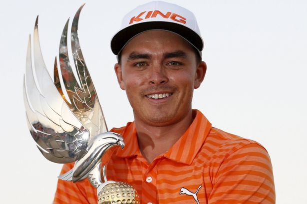 REUTERS  Ahmed Jadallah

World No. 4 Rickie Fowler holds his trophy after sealing victory the Abu Dhabi Golf Championship