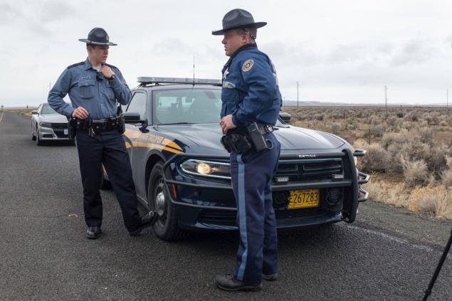 Oregon State Police monitor a checkpoint near the Malheur Wildlife Refuge near Burns Oregon