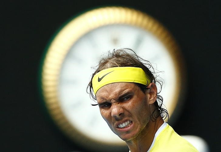 Spain's Rafael Nadal reacts during his first round match against Spain's Fernando Verdasco at the Australian Open tennis tournament at Melbourne Park Australia