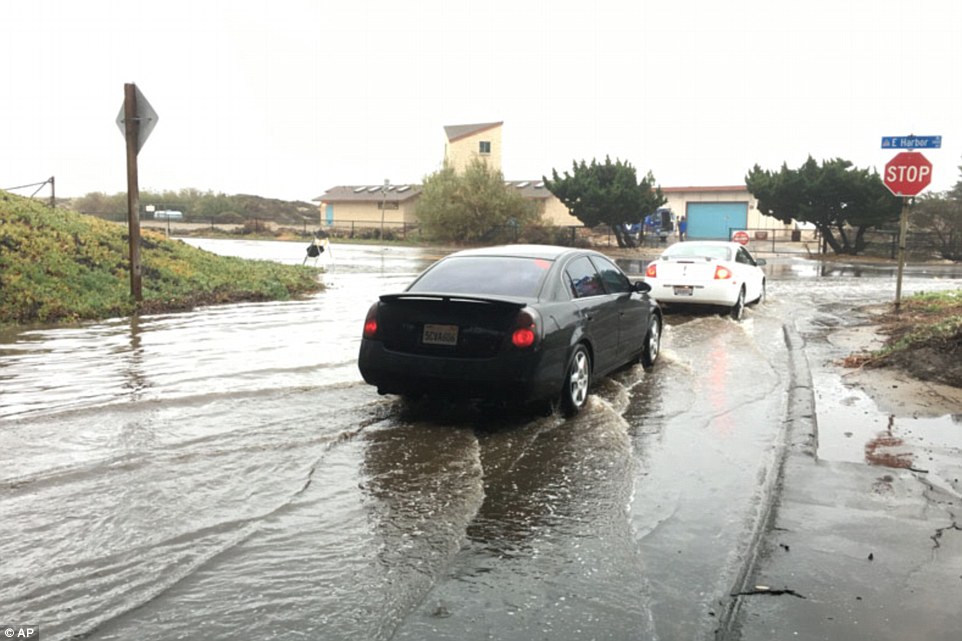 Rain causes puddles a few inches deep in Ventura California. Forecasters say the conditions are the beginning of a huge El Nino storm