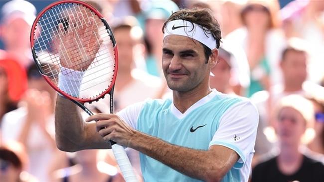 Roger Federer celebrates after defeating Dominic Thiem of in their semi-final match at the Brisbane International tennis tournament on Saturday 9 January 2016