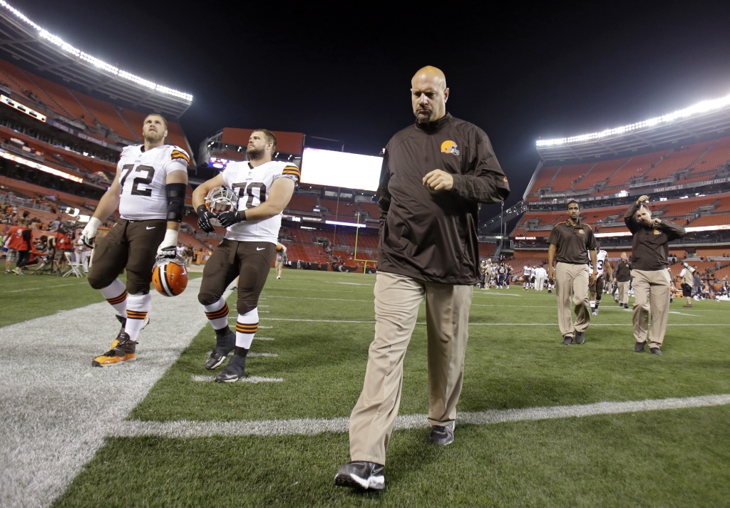 Cleveland Browns head coach Mike Pettine walks off the field after a 33-14 loss to the St. Louis Rams in a preseason NFL football game Saturday Aug. 23 2014 in Cleveland