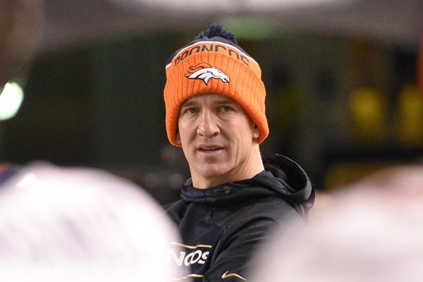 Denver Broncos quarterback Peyton Manning watches from the sideline as his team is losing to the Denver Broncos in the fourth quarter of an NFL football game in Pittsburgh Sunday Dec. 20 2015