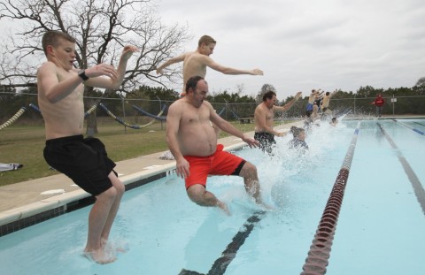 Residents took to the heated waters of Founder's Pool in Dripping Springs as they participated in the inaugural Polar Plunge