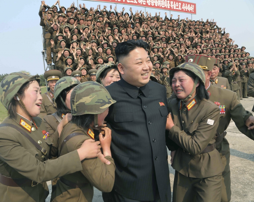 Reuters  KCNA KCNA North Korean leader Kim Jong Un greets a women's subunit during a rocket launching drill