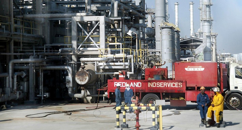 Workers rest at Ras Tannura's oil production plant near Dammam in Saudi Arabia's eastern province