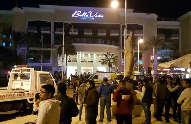 STRINGER  EPA  Egyptian security services outside the entrance to the Bella Vista Hotel in the Red Sea resort of Hurghada Egypt