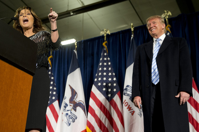 Former Alaska Gov. Sarah Palin left endorses Republican presidential candidate Donald Trump during a rally at the Iowa State University Tuesday Jan. 19