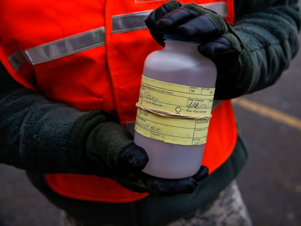 Sarah Rice  Getty Images The National Guard receives water samples from residents at a fire station Jan. 21 2016 in Flint Mich