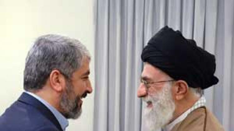 Iran's Supreme Leader Ayatollah Ali Khamenei greets Hamas leader Khaled Meshaal in Tehran