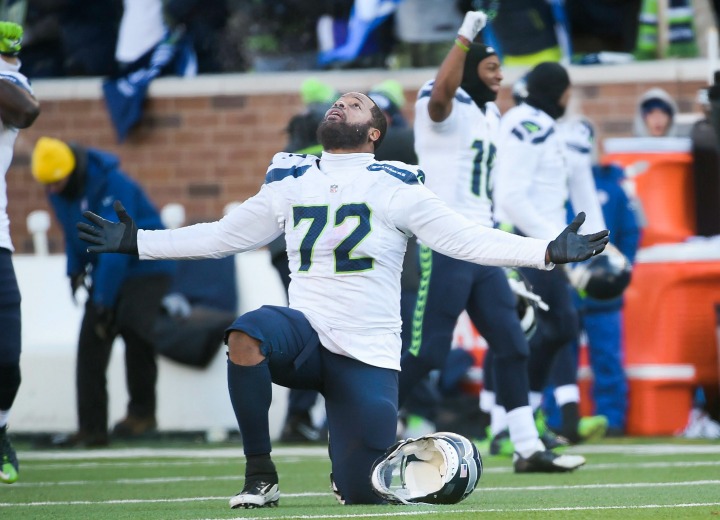 Seattle Seahawks defensive end Michael Bennett celebrates after Minnesota Vikings kicker Blair Walsh missed a game winning 27 yard field goal Minnesota in the final seconds of the second half of the NFC Wild Card Playoff game in Minneapolis Minnesota US