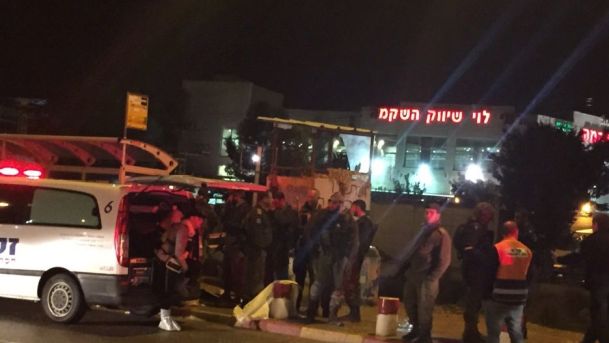 Security forces at the scene of the attack at Gush Etzion Junction