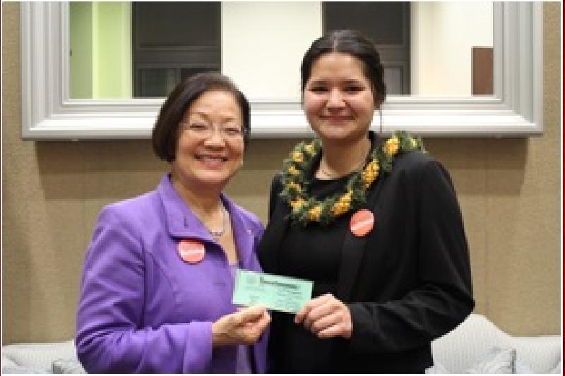 Senator Hirono and Sierra Schmitz holding Sierra’s State of the Union ticket