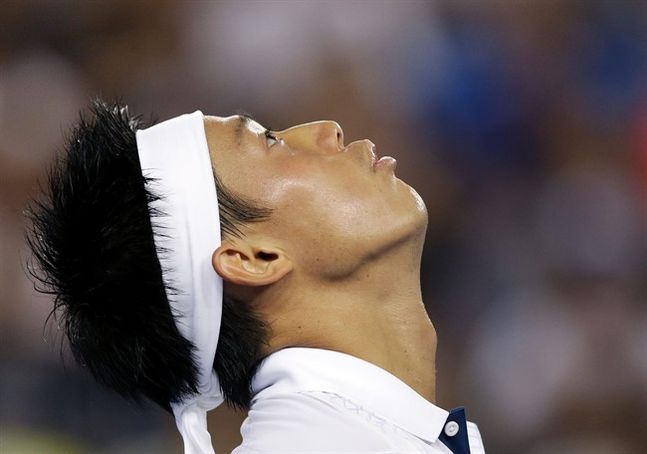 Kei Nishikori of Japan reacts to a lost point during his second round match against Austin Krajicek of the United States during their second round match at the Australian Open tennis championships in Melbourne Australia Wednesday Jan. 20 2016.(AP Phot