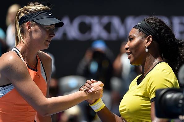 Serena Williams and Maria Sharapova shake hands after their match on Tuesday